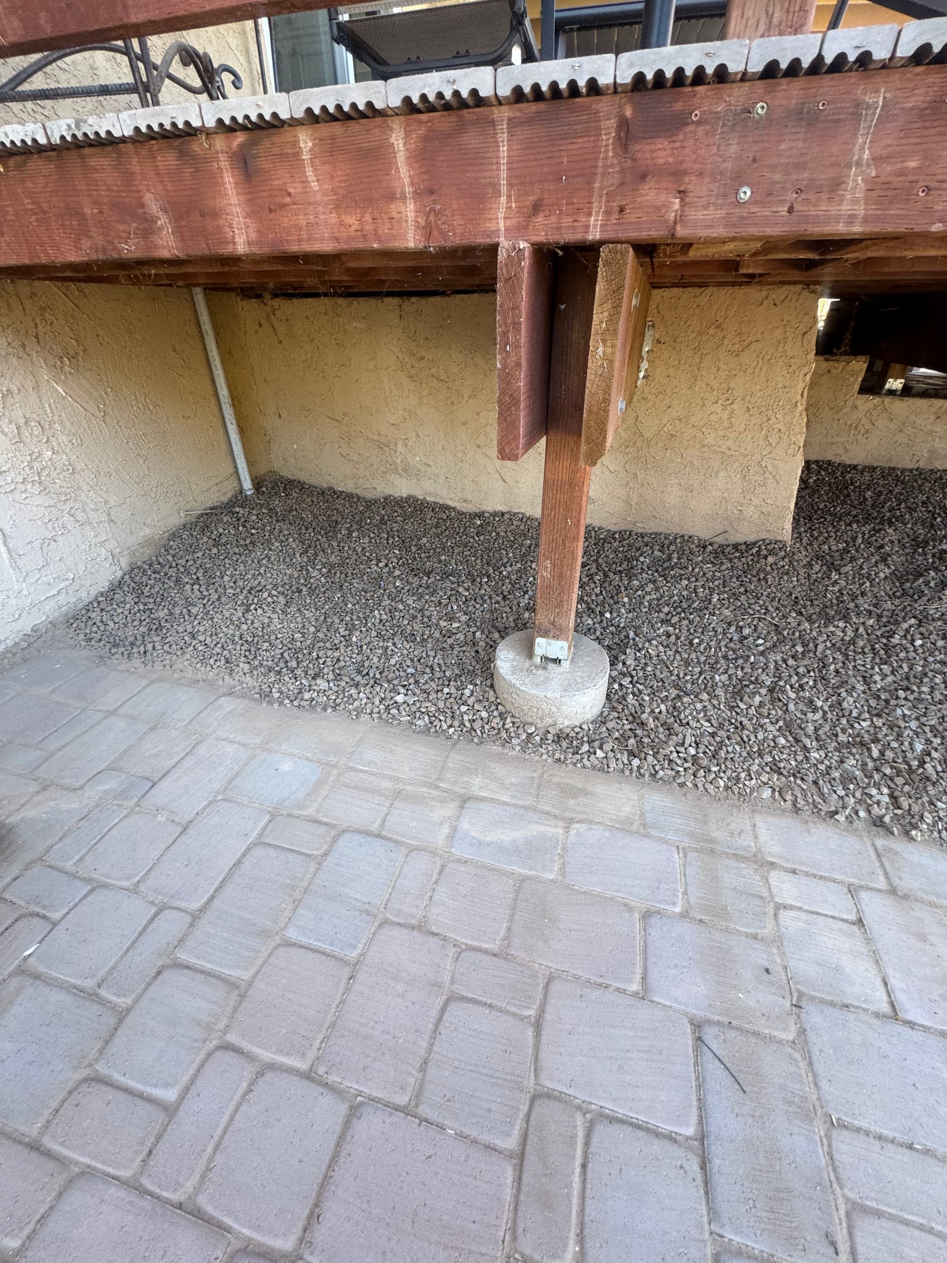 Rock Installation Under Deck